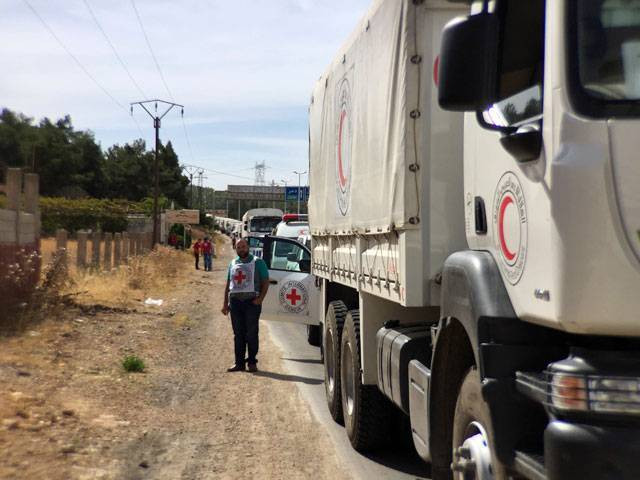 a file handout picture released by the international committee of the red cross icrc shows a relief convoy carrying medical items having a stopover 10 km from syrian cities of zabadani and madaya some 50 km northwest of damascus on october 18 2015 photo afp a file handout picture released by the international committee of the red cross icrc shows a relief convoy carrying medical items having a stopover 10 km from syrian cities of zabadani and madaya some 50 km northwest of damascus on october 18 2015 photo afp