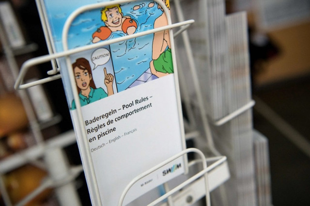 a flyer informs about pool rules in a public swimming pool in munich southern germany on friday photo afp a flyer informs about pool rules in a public swimming pool in munich southern germany on friday photo afp