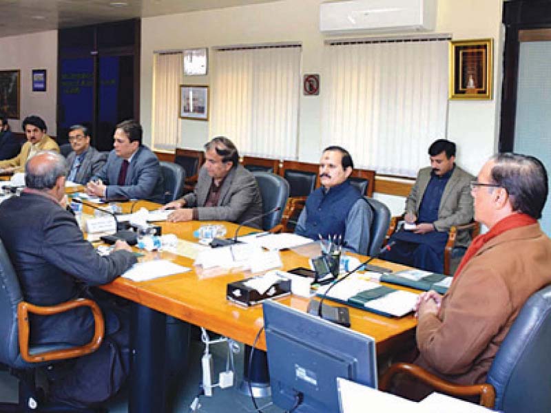 nab chairman presides a meeting at the bureau s headquarters in islamabad photo express