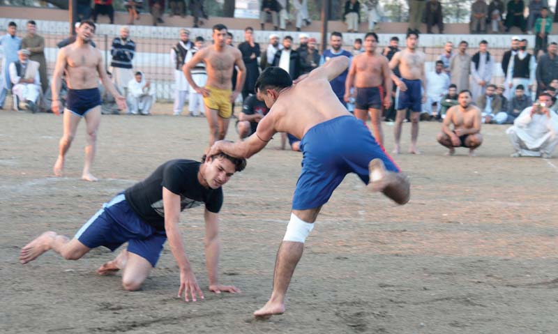 a scene of a kabaddi match in progress at the youth festival organised by jamaat e islami in the city photo muhammad iqbal express