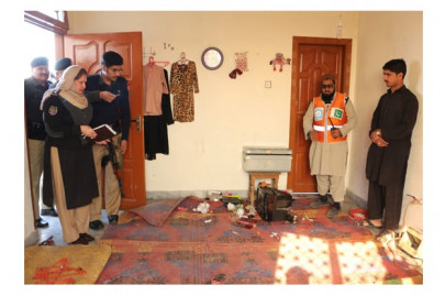 woman three children axed to death in peshawar