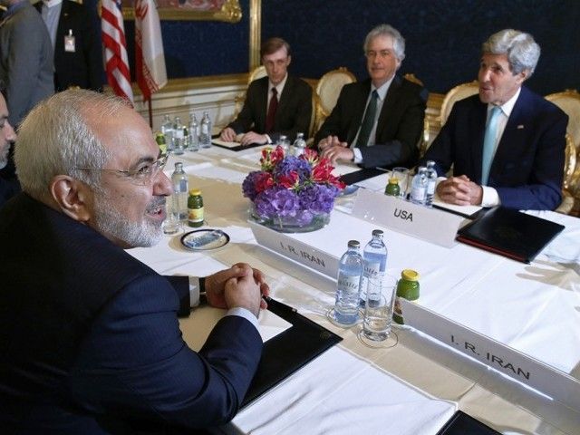 iran 039 s foreign minister mohammad javad zarif l meets with us secretary of state john kerry r during talks between the foreign ministers of the six powers negotiating with tehran on its nuclear programme in vienna on july 13 2014 photo afp