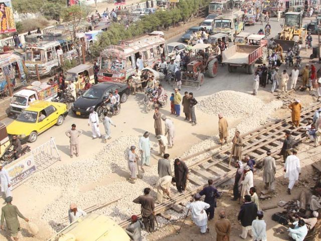 repair work on the railway track near natha khan bridge caused a massive traffic jam near drigh road on january 4 2016 photo aysha saleem express