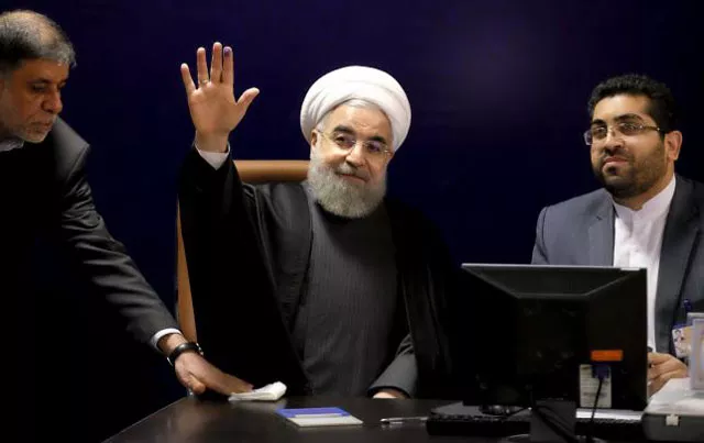 iranian president hassan rouhani c waves after he registered for february 039 s election of the assembly of experts the clerical body that chooses the supreme leader at the interior ministry in tehran on december 21 2015 photo reuters iranian president hassan rouhani c waves after he registered for february 039 s election of the assembly of experts the clerical body that chooses the supreme leader at the interior ministry in tehran on december 21 2015 photo reuters