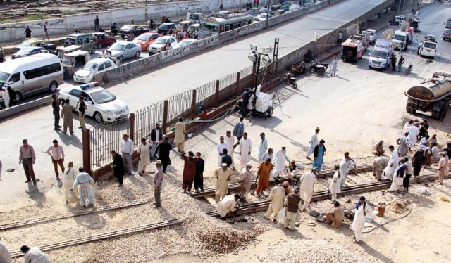 thousands of vehicles including ambulances and motorcycles were stuck in long queues in an unrelenting traffic pile near drigh road due to repair of a railway track before natha khan flyover photo aysha saleem express