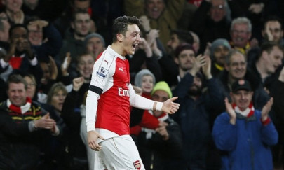 wenger optimistic over ozil return
