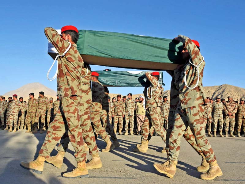 paramilitary frontier corps soldiers carry the coffins of their colleagues who were martyred in quetta photo afp