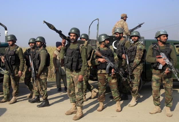 army personnel gather outside the bacha khan university in charsadda where an attack by militants took place on january 20 2016 photo reuters