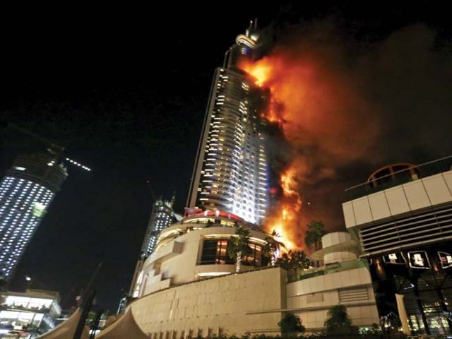 a fire engulfs the address hotel in downtown dubai on thursday december 31 2015 photo reuters