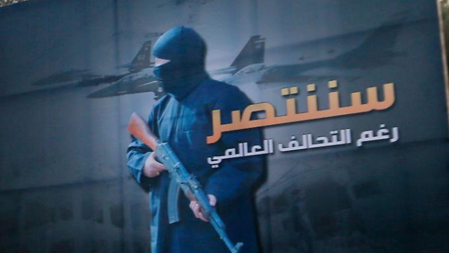 quot we will be victorious despite the global coalition quot a poster of the is in syria photo reuters quot we will be victorious despite the global coalition quot a poster of the is in syria photo reuters
