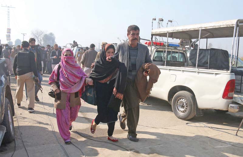 women rush out of bacha khan university after the incident photo muhammad iqbal express