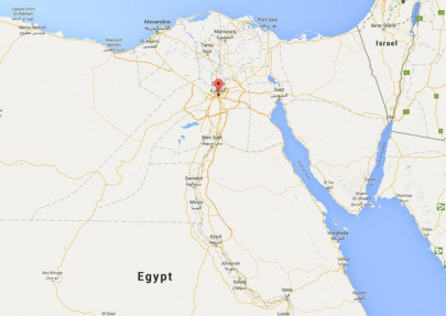 bomb kills six during police raid on cairo apartment