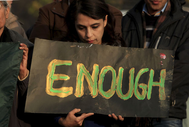 a civil society member holds a placard to protest against the attack on bacha khan university at a demonstration in islamabad pakistan january 21 2016 photo reuters