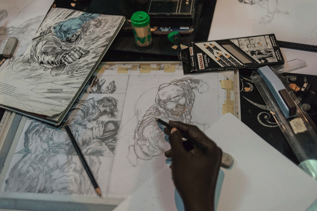an illustrator works on a sketch at the comic republic office in lagos on january 8 2016 comic republic is one of a handful of comic startups founded by jide martins in nigeria making african superheroes for stories set in africa photo afp an illustrator works on a sketch at the comic republic office in lagos on january 8 2016 comic republic is one of a handful of comic startups founded by jide martins in nigeria making african superheroes for stories set in africa photo afp