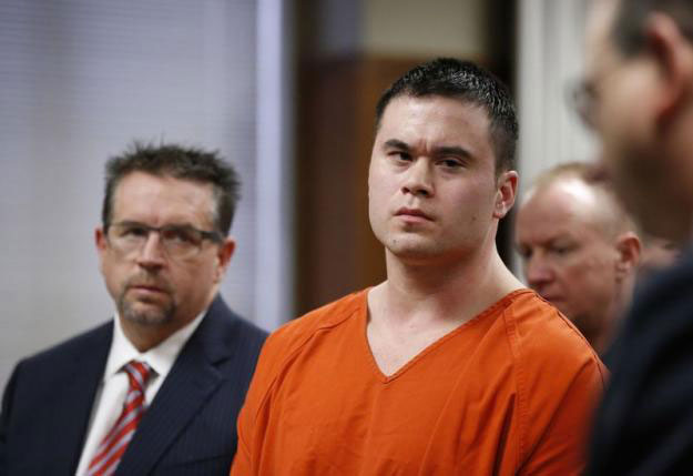 former oklahoma city police officer daniel holtzclaw c stands with his defense attorney scott adams l as his sentence is read during hearing in oklahoma city oklahoma january 21 2016 photo reuters