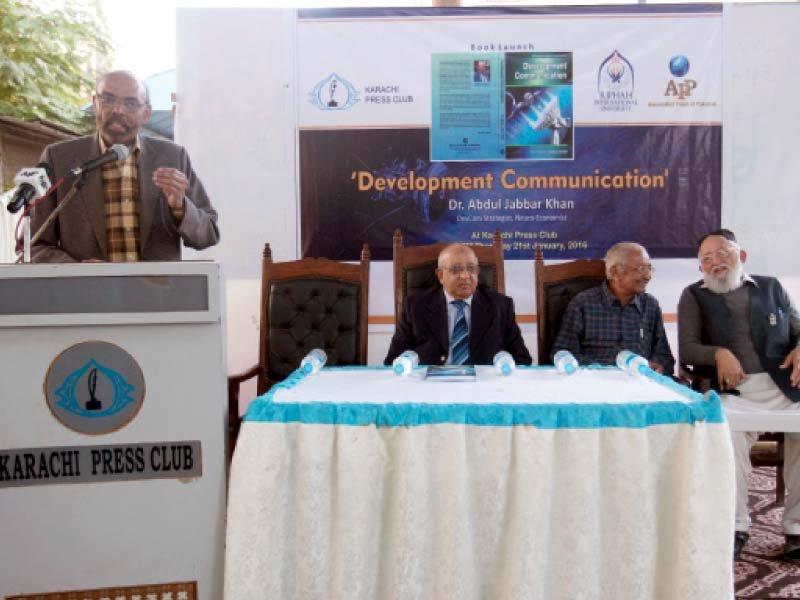 journalist dr abdul jabbar khan speaks at the launch of his book on development communication at karachi press club on thursday photo press release