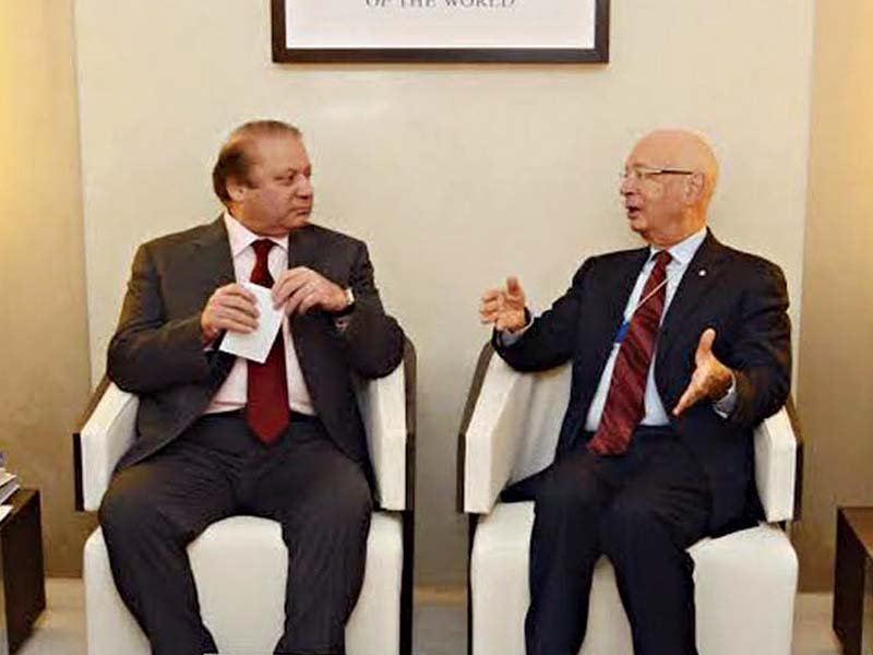 wef chairman prof klaus schwab talks with pm nawaz during a meeting in davos photo inp