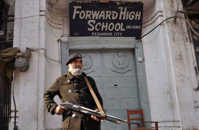 a pakistani policeman stood guard outside a school in peshawar the day after the taliban attacked bacha khan university photo afp a pakistani policeman stood guard outside a school in peshawar the day after the taliban attacked bacha khan university photo afp