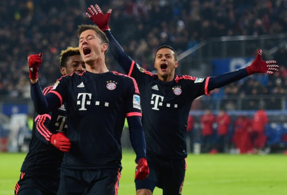 bayern go 11 clear as lewandowski nets twice