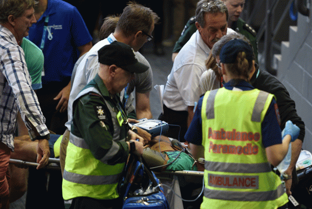 medical staff use a stretcher to carry nigel sears from the stadium in melbourne on january 23 2016 photo afp medical staff use a stretcher to carry nigel sears from the stadium in melbourne on january 23 2016 photo afp