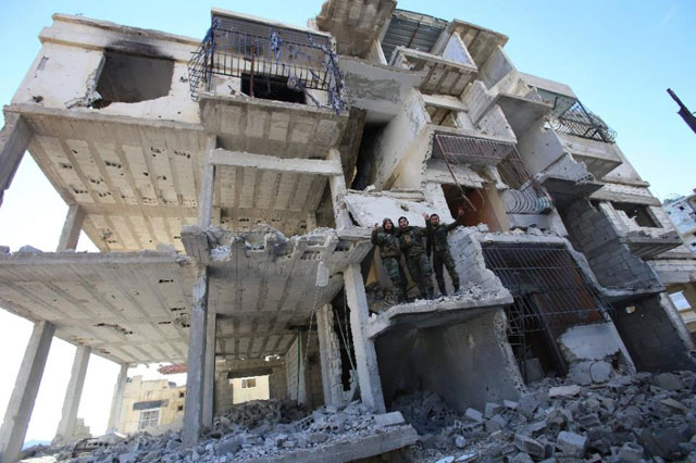 a destroyed building in salma in syria 039 s coastal latakia province on january 15 2016 photo afp