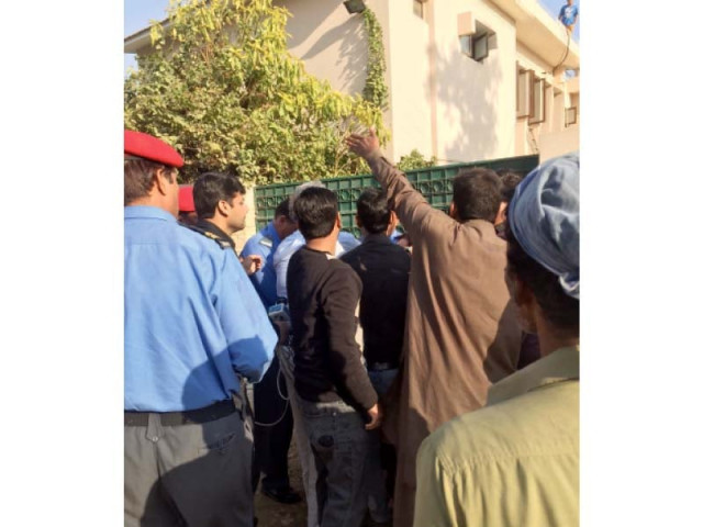 a man in plainclothes mistreated ivs founding member nighat mir during their silent protest in dha phase i photo express a man in plainclothes mistreated ivs founding member nighat mir during their silent protest in dha phase i photo express