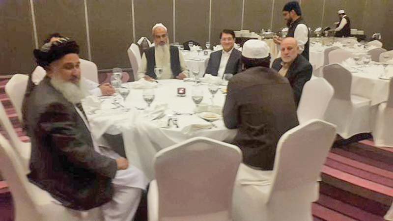 former afghan ministers umar daudzai and anwarul haq ahadi in a meeting with taliban representatives sher abbas stanekzai and abdul salam hanafi during the pugwash conference in doha photo courtesy javed hamim kakar