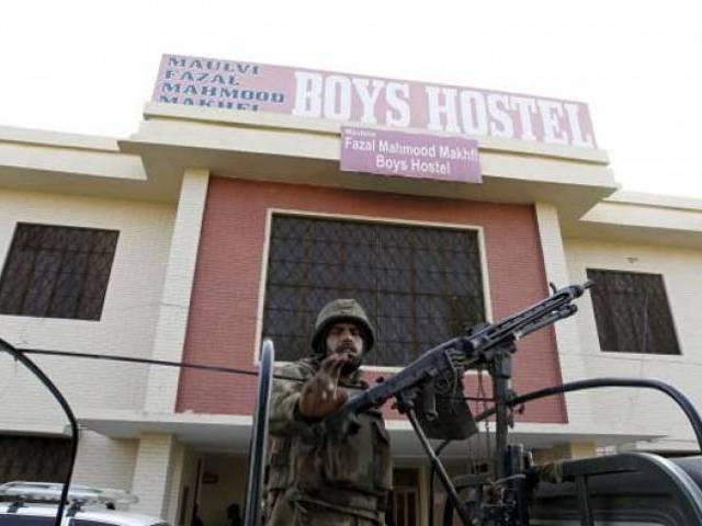 a soldier stands guard at the entrance to a dormitory where a militant attack took place in bacha khan university in charsadda pakistan january 20 2016