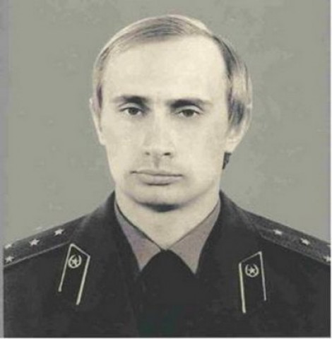 a young vladimir putin in his kgb uniform