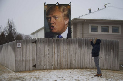 giant trump poster becomes pilgrimage site
