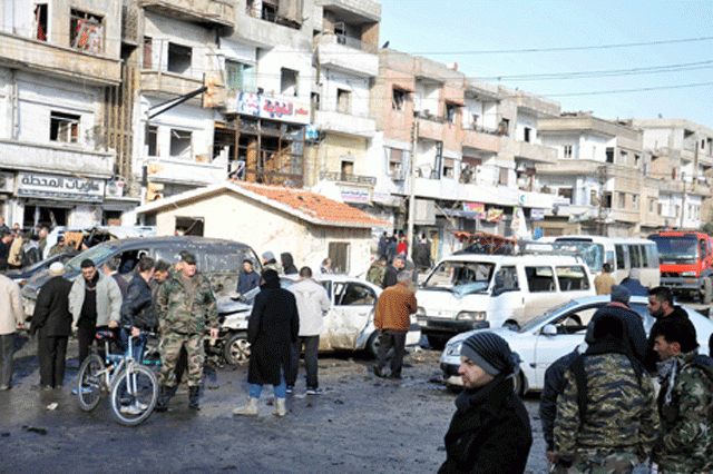 people inspect the site of a double bomb attack in the government controlled city of homs syria in this handout picture provided by sana on january 26 2016 photo reuters sana people inspect the site of a double bomb attack in the government controlled city of homs syria in this handout picture provided by sana on january 26 2016 photo reuters sana