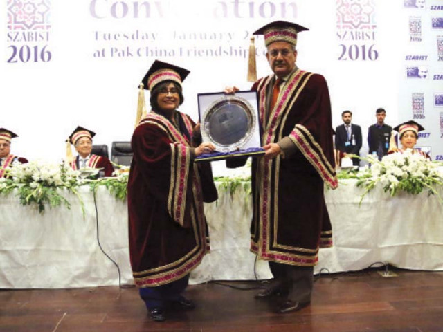 szabist chancellor dr azra fazal pechuho presents shield to senate chairman mian raza rabbani photo express szabist chancellor dr azra fazal pechuho presents shield to senate chairman mian raza rabbani photo express