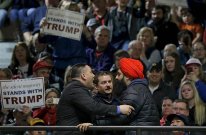 donald trump makes hat joke after ejecting sikh protester from rally donald trump makes hat joke after ejecting sikh protester from rally
