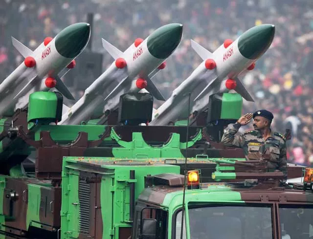 an indian soldier salutes as he rides an akash weapon system of air defence during india 039 s republic day parade in new delhi on january 26 2016 photo afp an indian soldier salutes as he rides an akash weapon system of air defence during india 039 s republic day parade in new delhi on january 26 2016 photo afp