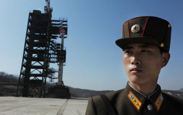 a north korean soldier stands guard at the sohae satellite launch station in dongchang ri on april 8 2012 photo afp a north korean soldier stands guard at the sohae satellite launch station in dongchang ri on april 8 2012 photo afp