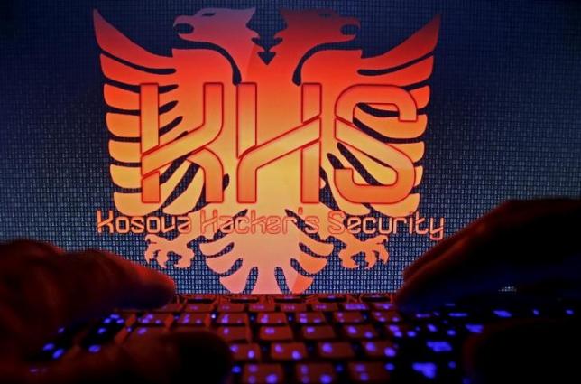 a man types on a keyboard in front of the logo of 039 039 kosova hackers security 039 039 in this photo illustration taken in sarajevo bosnia and herzegovina october 16 2015 photo reuters