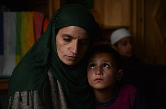 this photo taken on december 22 2015 shows hassina and her son at home in dardpora a himalayan village on the indian side of the de facto border that divides kashmir between india and pakistan hassina 039 s husband former rebel ali mohammad went missing along the border last autumn photo afp this photo taken on december 22 2015 shows hassina and her son at home in dardpora a himalayan village on the indian side of the de facto border that divides kashmir between india and pakistan hassina 039 s husband former rebel ali mohammad went missing along the border last autumn photo afp