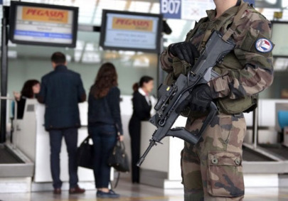 tempers flare at paris airport after fake bombs found