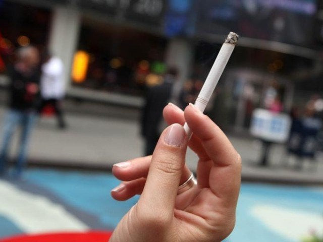 the decline was attributed to plain cigarette packaging laws and higher prices photo afp the decline was attributed to plain cigarette packaging laws and higher prices photo afp