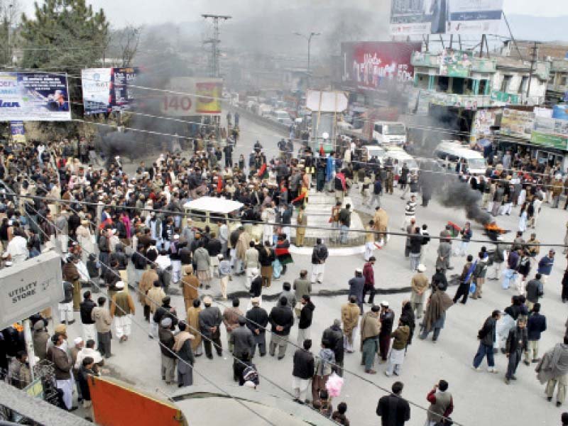 demonstrators burn tyres in protest at fawara chowk abbottabad photo ppi