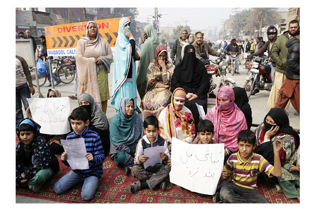 residents of samanabad holding a demonstration against orange line metro train photo online