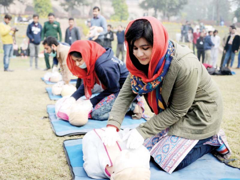 students of gcu lahore in a training session held by the rescue 1122 a few days ago photo abid nawaz express