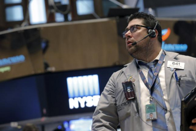 a trader works on the floor of the new york stock exchange january 27 2016 photo reuters a trader works on the floor of the new york stock exchange january 27 2016 photo reuters