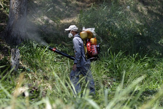 a health ministry employee fumigates against aedes aegypti mosquito at a home in caracas on january 28 2016 venezuela has recorded 4 700 suspected cases of people infected by the zika virus which is thought to cause brain damage in babies the health ministry said on thursday photo afp a health ministry employee fumigates against aedes aegypti mosquito at a home in caracas on january 28 2016 venezuela has recorded 4 700 suspected cases of people infected by the zika virus which is thought to cause brain damage in babies the health ministry said on thursday photo afp