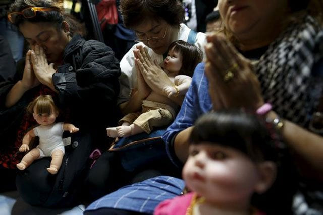 the plastic dolls about the size of a real baby are called quot look thep quot or quot child angel quot photo reuters the plastic dolls about the size of a real baby are called quot look thep quot or quot child angel quot photo reuters