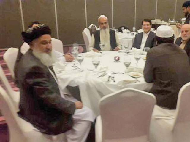 former afghan ministers umar daudzai and anwarul haq ahadi in a meeting with taliban representatives sher abbas stanekzai and abdul salam hanafi during the pugwash conference in doha photo courtesy javed hamim kakar