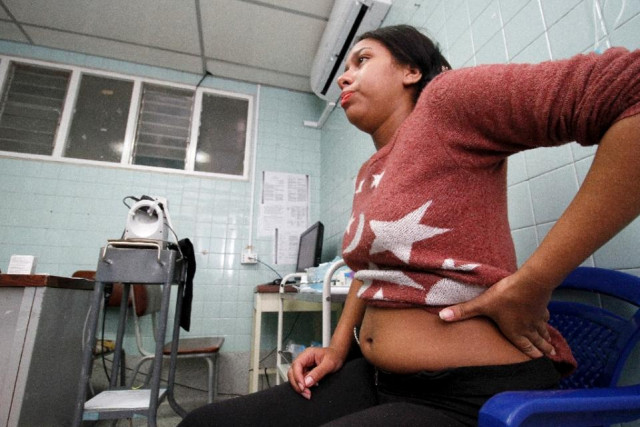pregnant woman angelica prato infected by the zika virus is attended at the erasmo meoz university hospital in cucuta colombia on january 25 2016 photo afp pregnant woman angelica prato infected by the zika virus is attended at the erasmo meoz university hospital in cucuta colombia on january 25 2016 photo afp