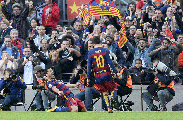 luis suarez l celebrates with lionel messi r after scoring at the camp nou stadium in barcelona on january 30 2016 photo afp