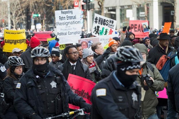 chicago demonstrators called for an end to gun violence and the resignation of chicago mayor rahm emanuel on december 31 2015 after the deaths of 19 year old college student quintonio legrier and his 55 year old neighbor bettie jones photo afp