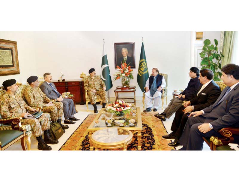 pm nawaz and army chief gen raheel talk during a high level meeting at the pm house photo ppi